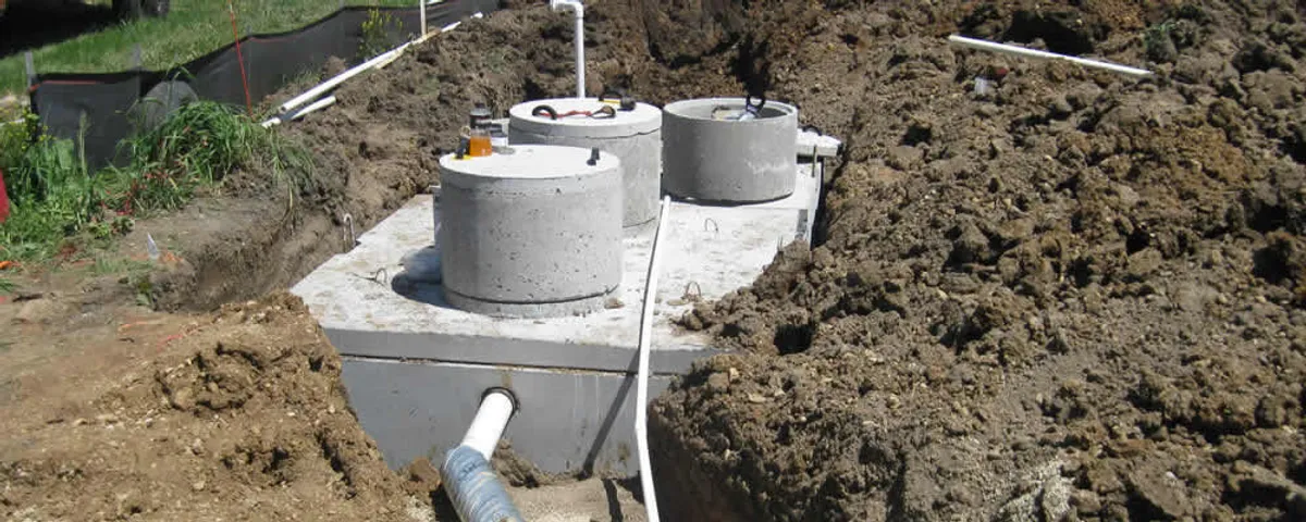 Septic system repair and installation site with tank access ports in San Diego, CA